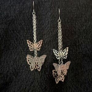 Silver Butterfly Dangling Earrings, 3 Each Ear. 3.25” from top to bottom.